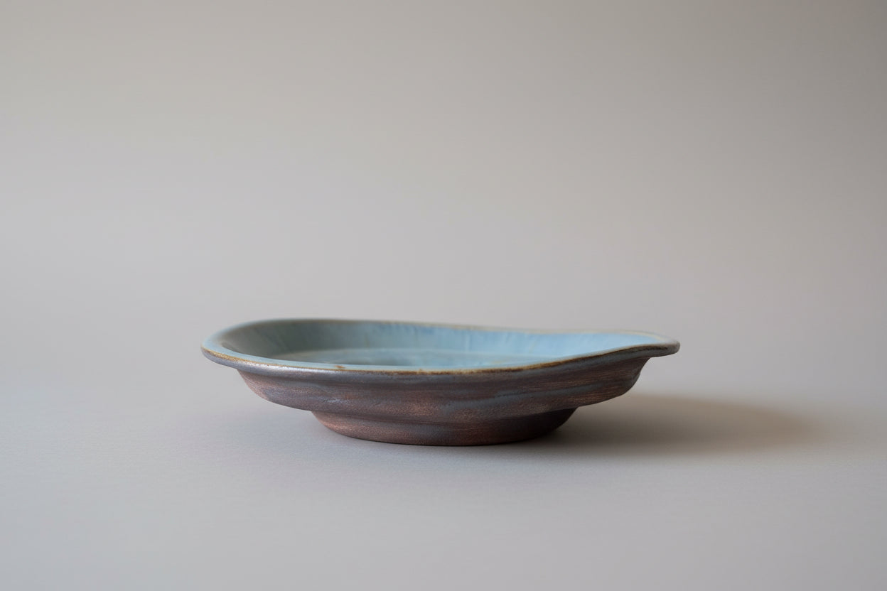Shallow layered blue bowl