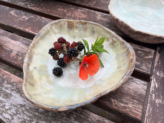 Triangular bowl in soft creams and greens