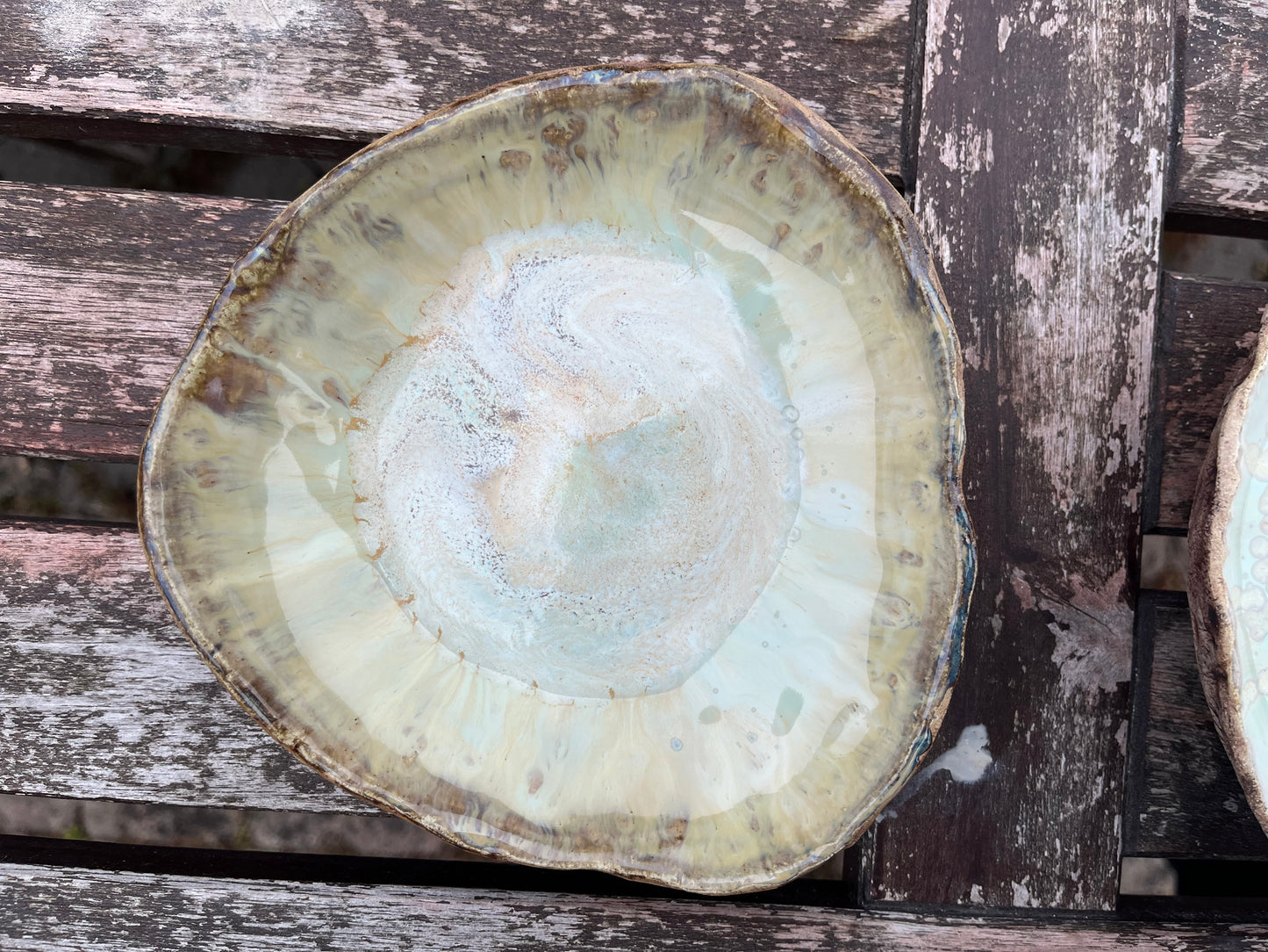 Triangular bowl in soft creams and greens