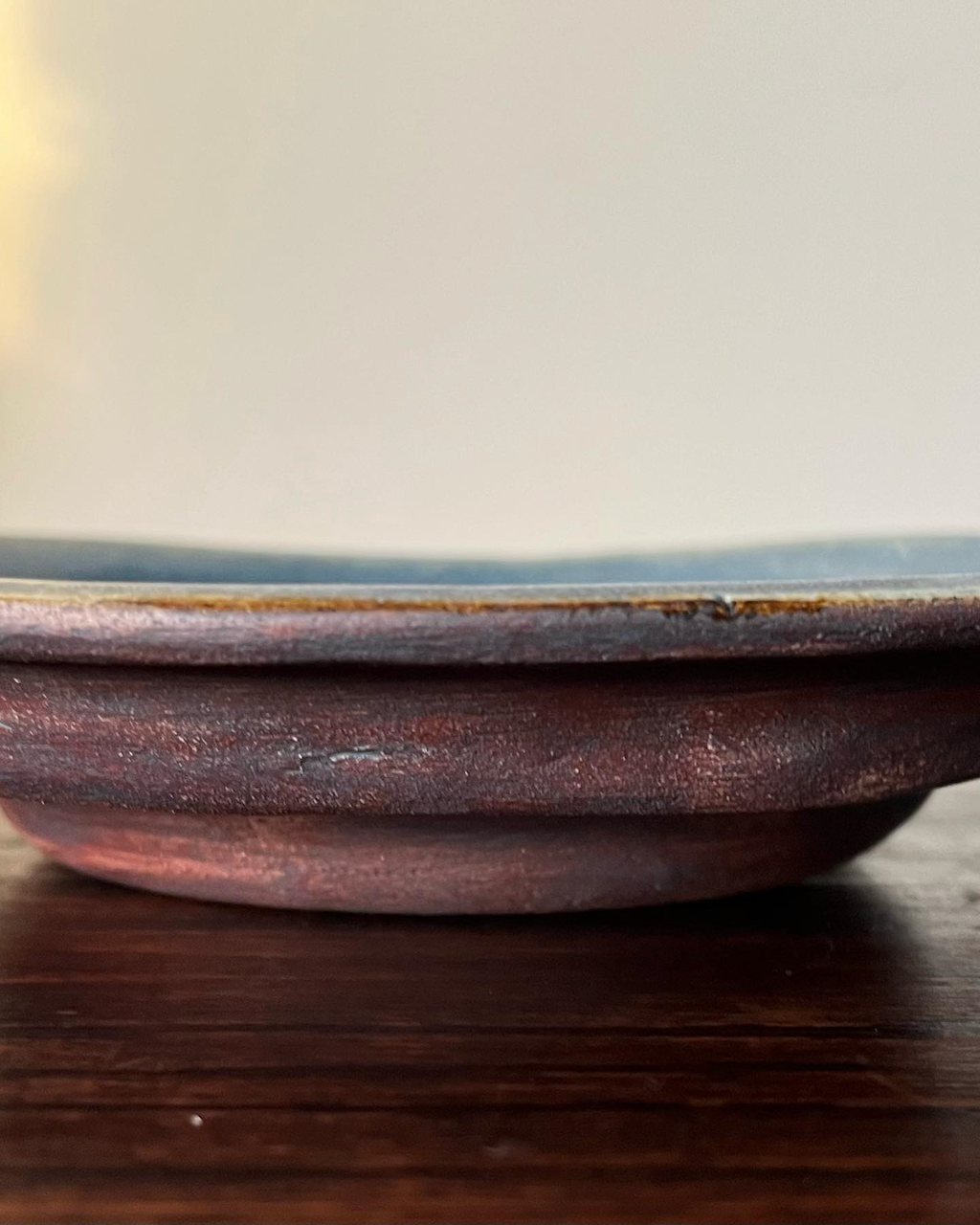 Shallow layered blue bowl